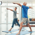 man and woman doing warrior pose on yoga mats